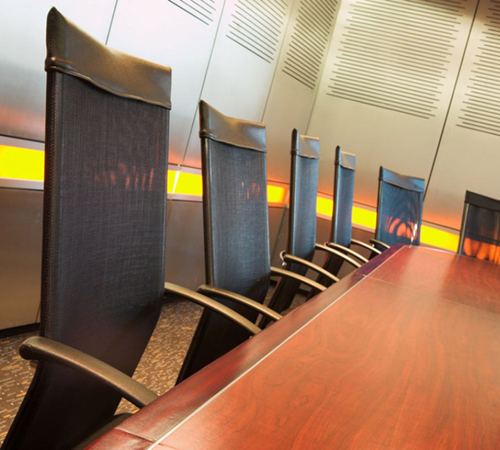 six office chairs around a conference table